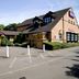 Premier Inn Northampton South - Wootton exterior with parking area and entrance in Northampton