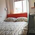 Pod Inn Shanghai Lujiazui guest room with bed, window and compact sink area in Shanghai