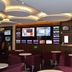 Ramada Hotel & Suites by Wyndham Sydney Cabramatta sports bar with TVs, betting screens and seating