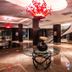 Çelik Palace Hotel Convention Center & Thermal Spa lobby in Bursa with red chandelier and marble floors