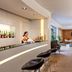 iH Hotels Milano Watt 13 bar with bartender and stools in Milan