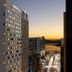 Fairfield by Marriott Busan high-rise at sunset with city lights and waterfront view in Busan