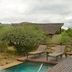 Pilanesberg Private Lodge in Pilanesberg with a plunge pool and lounge chairs overlooking bushland