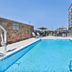 Fairfield by Marriott Inn & Suites Cincinnati Airport South/Florence pool with lounge chairs and umbrellas