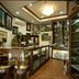 Centara Life Hotel Mae Sot display shop with glass cabinets and wooden counter in Mae Sot