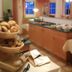 Breakfast buffet at Gasthaus-Landhotel Traunstein in Abtenau with bread baskets and table settings