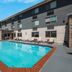 Hotel 28 Boise Airport, an Ascend Collection Hotel in Boise: outdoor pool beside the hotel building