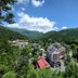 Shima Grand Hotel in Nakanojo with mountain valley views and lush green hills under a blue sky