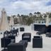 Studio Suite at Marina Cabo Plaza rooftop terrace with lounge chairs and marina views in Cabo San Lucas