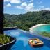 Anantara Maia Seychelles Villas infinity pool overlooking Anse Boileau bay and tropical hillside