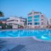 Ideal Pearl Hotel Adults Only in Marmaris with outdoor pool, circular hot tub, and sun loungers