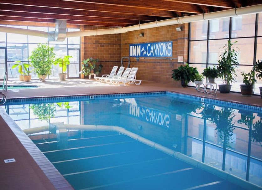 Inn at the Canyons in Monticello indoor pool with lounge chairs and large windows