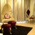 Golden Phoenix Hotel Boracay in Boracay: ornate gold seating with red velvet chairs and curtains