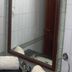 Hotel Casa di William in Khajurāho bathroom sink with mirror and towel rolled on counter