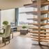 Arass Hotel & Business Flats Antwerp dining area with large window city view and staircase