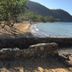 Palawan Sandcastles The Beach House in Busuanga with sandy beach, stone seawall and coastal bay view