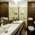 Hotel Blanca Resort & Spa in Šišava bathroom with double sinks, toilet, bidet and bathtub