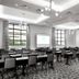 Embassy Suites by Hilton Tampa Airport Westshore meeting room in Tampa with rows of tables and chairs