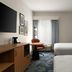 Hampton Inn by Hilton Hopewell Fort Lee room with two beds, desk, TV and window with curtains in Hopewell
