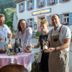 Guests toast at Goldener Adler Oberried - Hotel & Appartements in Oberried, outside the hotel
