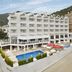 Ideal Pearl Hotel Adults Only in Marmaris with outdoor pool, terrace seating and mountain views