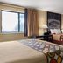 Super 8 by Wyndham Dyersville guest room with two beds and a window
