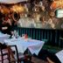 The Lawrence, Burnley restaurant dining room with floral wallpaper and set tables