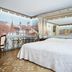 Romantik Hotel Wilden Mann Luzern guest room with Lucerne city mural and balcony-style view