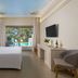 Atrium Palace Thalasso Spa Resort And Villas in Kalathos guest room with balcony and sea-view doors