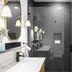 Mint House Dallas Downtown By Kasa bathroom with glass shower, double vanity mirrors, and black fixtures