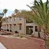The Sands Vacation Resort in Lake Havasu City exterior with palm trees and desert landscaping