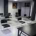 Alezan Hôtel & Résidence in Toulouse meeting room with black chairs arranged in rows and a table