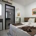 Tropico Praia Hotel in Maceió guest room with twin beds, towels and en suite bathroom doorway