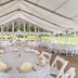 Traditions Hotel & Spa Johnson City tented wedding venue with round banquet tables and white chairs