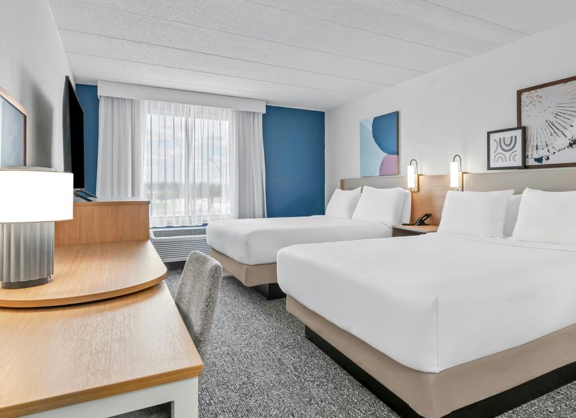 Spark by Hilton Mechanicsburg Harrisburg West guest room with two beds and window seating in Mechanicsburg