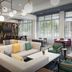 Hampton Inn Huntsville/Village of Providence lobby lounge with seating and large windows in Huntsville