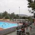 Tigullio Camping & Resort in Sestri Levante with outdoor pool, palm trees and mountain views