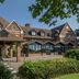 DoubleTree by Hilton Stratford upon Avon exterior with brick facade, clock tower and covered entrance
