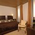 Garni-Hotel Adler in Ostfildern guest room with twin beds, armchair, and large window