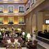 Euro Park Otel Istanbul atrium lobby with ornate seating, chandeliers, and indoor balconies