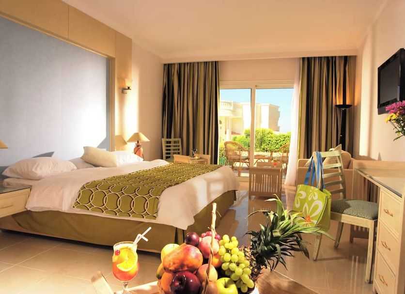 Naama Bay Hotel & Resort room with balcony garden view in Sharm el-Sheikh