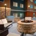 Residence Inn by Marriott Lubbock Southwest patio with fire pit and lounge seating at dusk