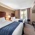 Comfort Inn & Suites Virginia Beach - Norfolk Airport guest room with two beds and window view