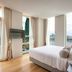 Aloft Seoul Gangnam guest room with city views, floor-to-ceiling windows, and king bed in Seoul