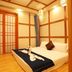 Xianyang Ocean Hotspring World guest room with tatami-style bed and sliding shoji doors in Xianyang