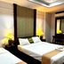 Palette Bangkok Natural Resort and Spa in Bangkok: twin beds with bedside lamps in a guest room