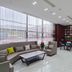 Gem Hotel Nanjing Dachang Xinhua Road Pedestrian Street lobby with seating and bookshelf wall