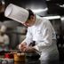 Shin Osaka Esaka Tokyu Rei Hotel chef preparing food in a hotel kitchen in Suita