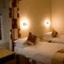 Station Hotel And Restaurant, Melrose: twin room with two single beds and wall lights