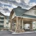 Lodge at Five Oaks Pigeon Forge in Pigeon Forge, covered stone entrance with gabled roof